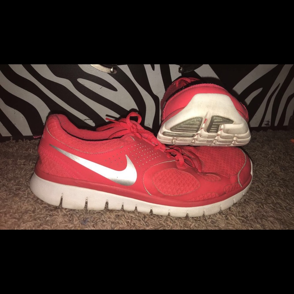 Pink nike running shoes